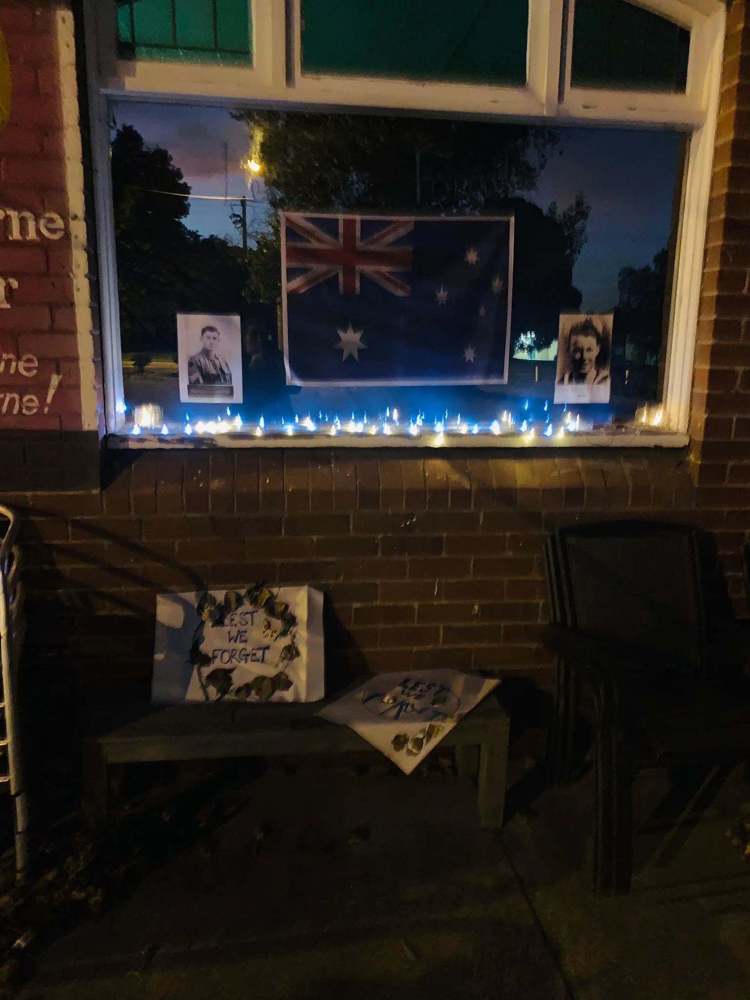 Anzac Day memorial window display at the Palace Hotel
